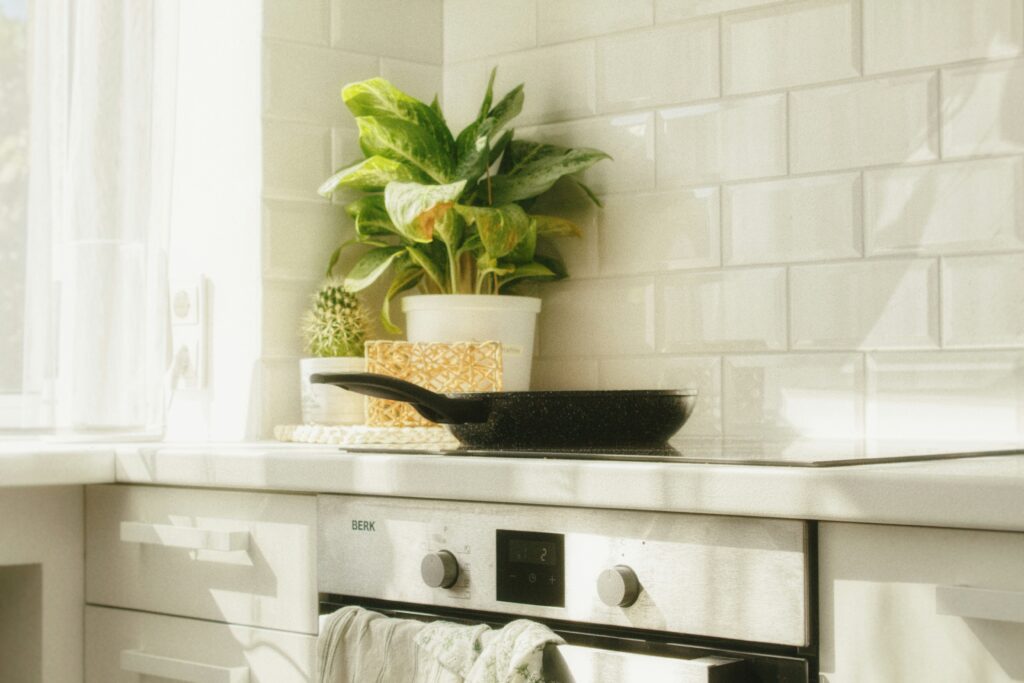 Clean stove after professional summer home cleaning service