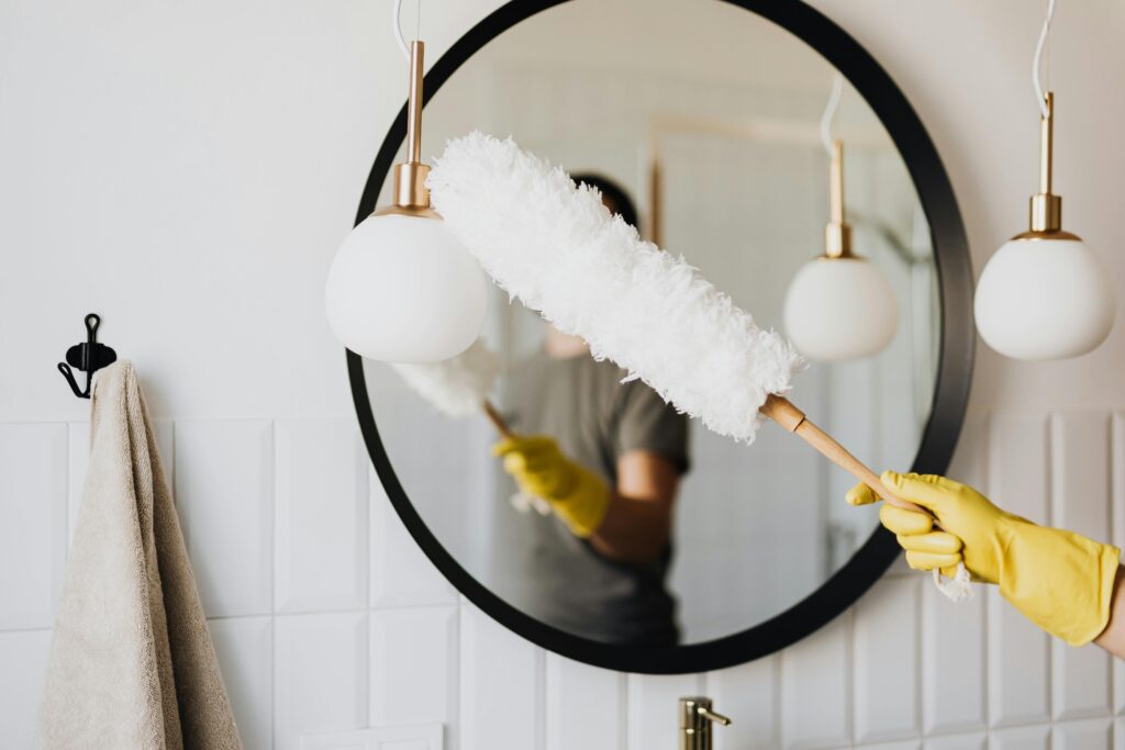 Woman doing fall cleaning in her home to prepare for the back-to-school season